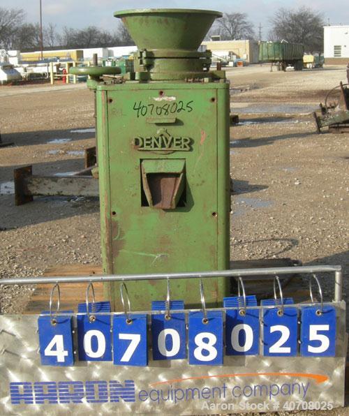 Used Denver Equipment Size #2 Coffee Mill/ Cone Crusher, carbon steel. Approximate 12" diameter chamber with cone. Top feed with hopper, (2) side bottom outlets. Driven by an approximate 1 hp motor.