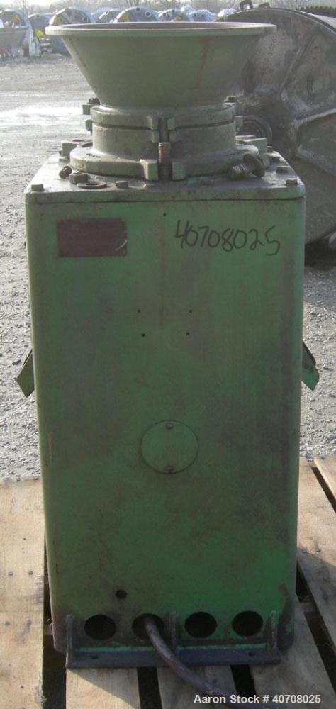 Used Denver Equipment Size #2 Coffee Mill/ Cone Crusher, carbon steel. Approximate 12" diameter chamber with cone. Top feed with hopper, (2) side bottom outlets. Driven by an approximate 1 hp motor.