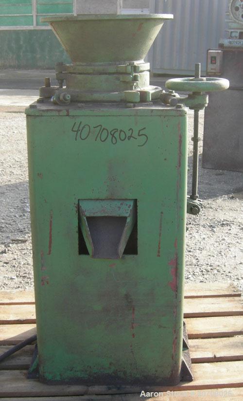 Used Denver Equipment Size #2 Coffee Mill/ Cone Crusher, carbon steel. Approximate 12" diameter chamber with cone. Top feed with hopper, (2) side bottom outlets. Driven by an approximate 1 hp motor.