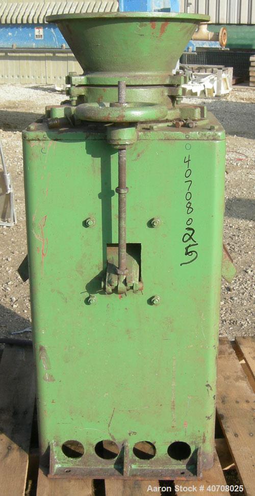 Used Denver Equipment Size #2 Coffee Mill/ Cone Crusher, carbon steel. Approximate 12" diameter chamber with cone. Top feed with hopper, (2) side bottom outlets. Driven by an approximate 1 hp motor.