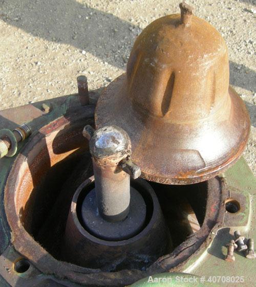 Used Denver Equipment Size #2 Coffee Mill/ Cone Crusher, carbon steel. Approximate 12" diameter chamber with cone. Top feed with hopper, (2) side bottom outlets. Driven by an approximate 1 hp motor.