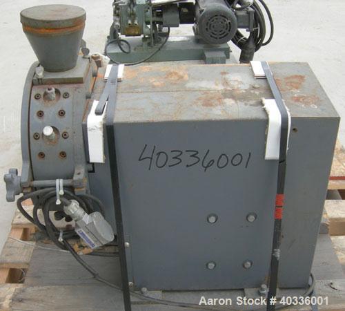 Used Thomas Wiley Cutting Mill, model 4, carbon steel. 141 cubic inch chamber. 7-3/4" diameter x 3" deep 4 bolt on blade rotor. 6 stationary bed knives. Top feed with hopper, bottom discharge. Driven...