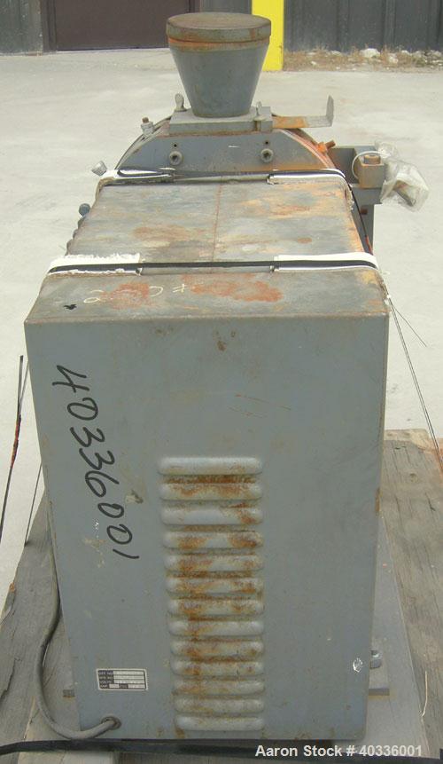 Used Thomas Wiley Cutting Mill, model 4, carbon steel. 141 cubic inch chamber. 7-3/4" diameter x 3" deep 4 bolt on blade rotor. 6 stationary bed knives. Top feed with hopper, bottom discharge. Driven...