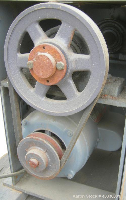 Used Thomas Wiley Cutting Mill, model 4, carbon steel. 141 cubic inch chamber. 7-3/4" diameter x 3" deep 4 bolt on blade rotor. 6 stationary bed knives. Top feed with hopper, bottom discharge. Driven...