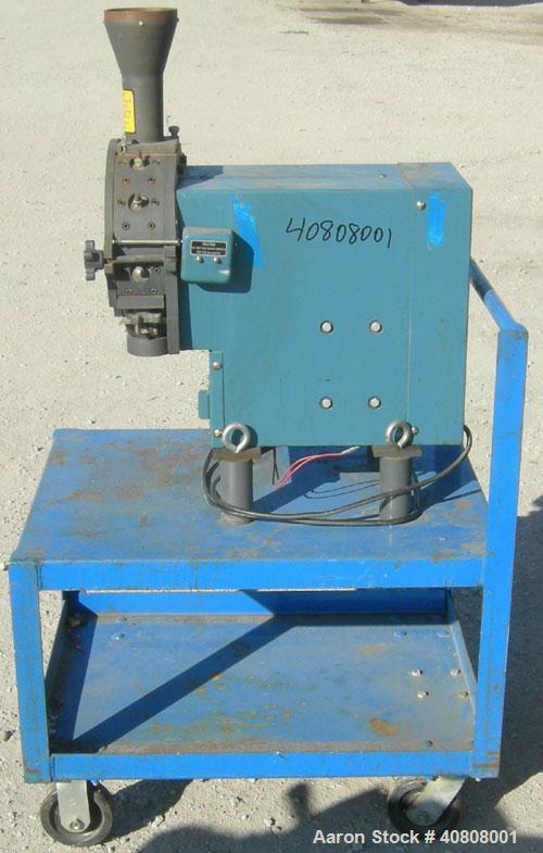 Used Thomas Wiley Cutting Mill, Model 4, Carbon Steel. 141 cubic inch chamber, 7-3/4" diameter x 3" deep. 4 bolt on blade rotor. 6 stationary bed knives. Top feed with hopper, bottom discharge, hinge...