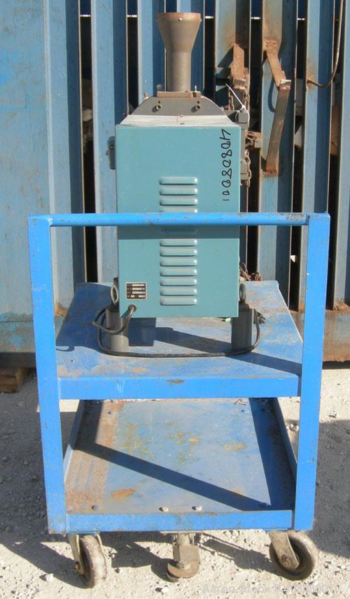 Used Thomas Wiley Cutting Mill, Model 4, Carbon Steel. 141 cubic inch chamber, 7-3/4" diameter x 3" deep. 4 bolt on blade rotor. 6 stationary bed knives. Top feed with hopper, bottom discharge, hinge...