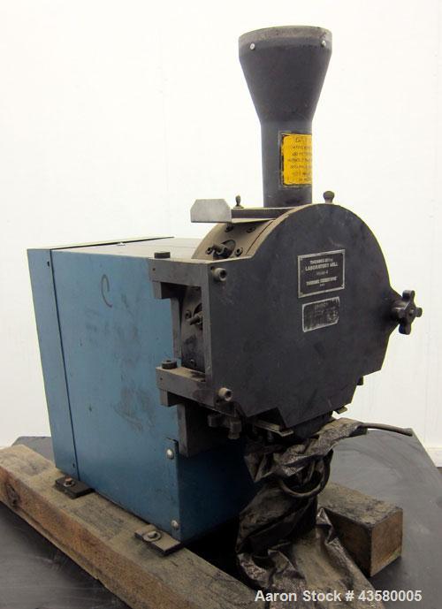 Used Thomas Wiley Cutting Mill, Model 4, Carbon Steel. 141 Cubic inch chamber 7-3/4” diameter x 3” deep. (4) Bolt on blade rotor, 6 stationary bed knives. Top feed with hopper, bottom discharge, hing...