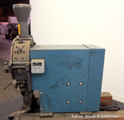 Used Thomas Wiley Cutting Mill, Model 4, Carbon Steel. 141 Cubic inch chamber 7-3/4” diameter x 3” deep. (4) Bolt on blade rotor, 6 stationary bed knives. Top feed with hopper, bottom discharge, hing...