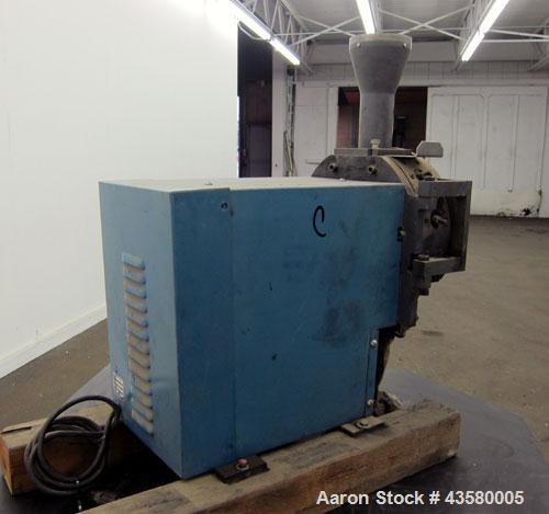 Used Thomas Wiley Cutting Mill, Model 4, Carbon Steel. 141 Cubic inch chamber 7-3/4” diameter x 3” deep. (4) Bolt on blade rotor, 6 stationary bed knives. Top feed with hopper, bottom discharge, hing...