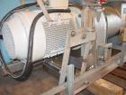 Used Bucher apple grinding disc mill, model CM50, stainless steel. 30 kW motor for main grinding head, 3 kW motor for 14 inch diameter x 30 inch long feed conveyor in self contained hopper, 9.5 inch ...