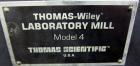 Used Thomas Wiley Cutting Mill, Model 4, Carbon Steel. 141 Cubic inch chamber 7-3/4” diameter x 3” deep. (4) Bolt on blade rotor, 6 stationary bed knives. Top feed with hopper, bottom discharge, hing...