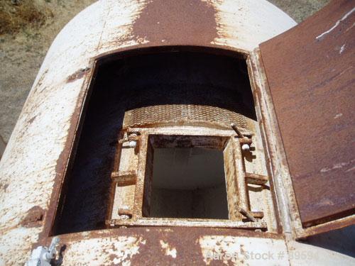 Used Paul O Abbe Pebble Mill, Model 4B, Carbon Steel, Alumina Lined. Jacketed chamber 48" diameter x 60" long. 11" x 14" charge/discharge port with cover. Driven by a 20 HP, 3/60/230/460 Volt motor w...