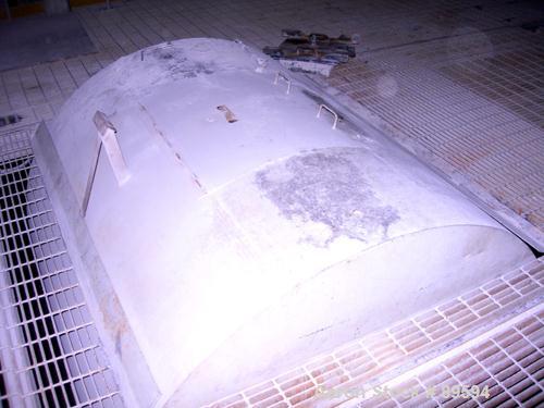Used Paul O Abbe Pebble Mill, Model 4B, Carbon Steel, Alumina Lined. Jacketed chamber 48" diameter x 60" long. 11" x 14" charge/discharge port with cover. Driven by a 20 HP, 3/60/230/460 Volt motor w...