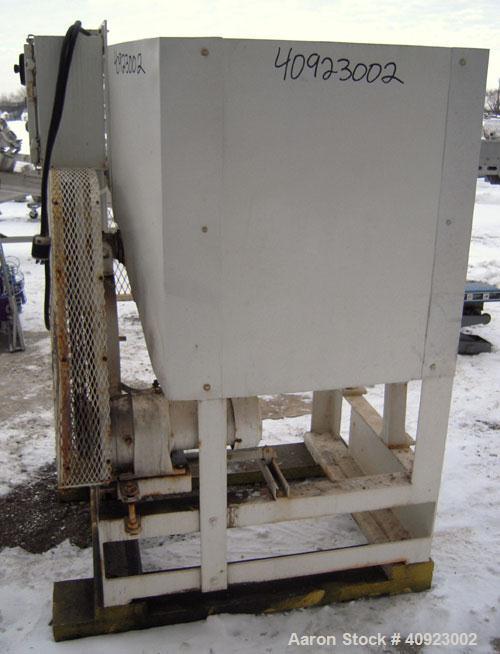 Used Paul O Abbe Ball Mill, Carbon Steel. Non-Jacketed ceramic lined horizontal chamber 18" diameter x 24" long. 7 1/2" x 9 1/4" charge/discharge port with cover. Driven by an approximate 2 hp gearmo...