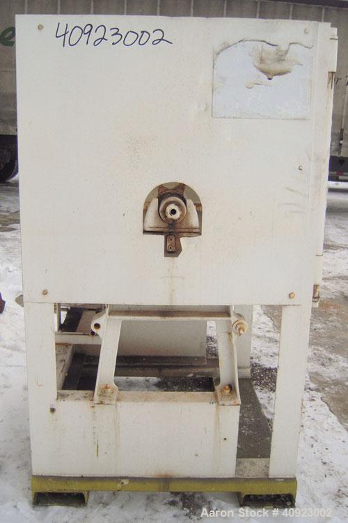 Used Paul O Abbe Ball Mill, Carbon Steel. Non-Jacketed ceramic lined horizontal chamber 18" diameter x 24" long. 7 1/2" x 9 1/4" charge/discharge port with cover. Driven by an approximate 2 hp gearmo...