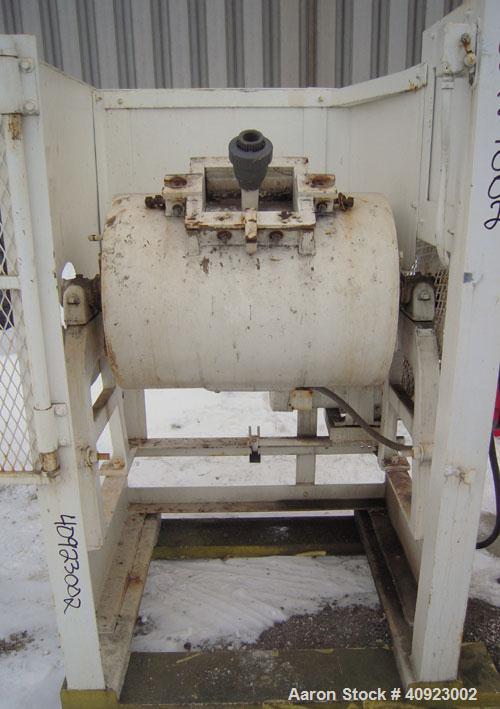 Used Paul O Abbe Ball Mill, Carbon Steel. Non-Jacketed ceramic lined horizontal chamber 18" diameter x 24" long. 7 1/2" x 9 1/4" charge/discharge port with cover. Driven by an approximate 2 hp gearmo...