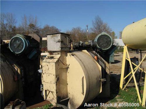Used Bliss Pioneer Model B-200A. 400 hp thru (2) 200 hp, 1200 rpm motors. 1 set of rolls, 1 die, feed chute, stainless steel door, lube system, mounted on mild steel base. Last running 8-1/4 wide rol...