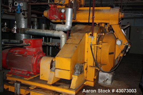 Used Buhler DPAA Pellet Mill. Total capacity 7.5 t/hour, total throughput performance 47 m3/hour, press rolls 12.5 x 7.1" (320 x 182 mm), form diameter/width 26/7" (660/178 mm), main motor performanc...