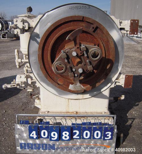 Used California Pellet Mill, Model 7122, carbon steel. Unit includes front hood and conditioner. Missing both motors, die, and rollers.