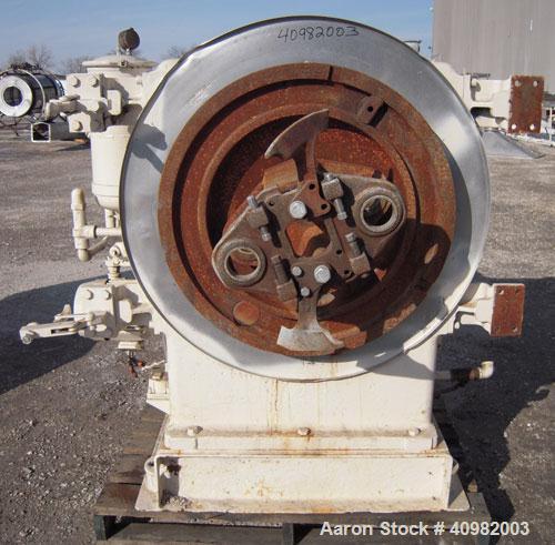 Used California Pellet Mill, Model 7122, carbon steel. Unit includes front hood and conditioner. Missing both motors, die, and rollers.