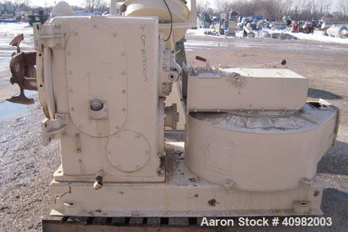 Used California Pellet Mill, Model 7122, carbon steel. Unit includes front hood and conditioner. Missing both motors, die, and rollers.
