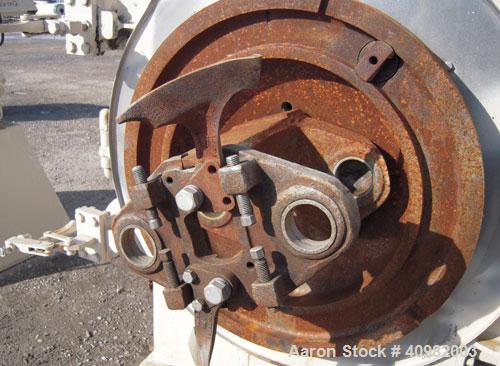 Used California Pellet Mill, Model 7122, carbon steel. Unit includes front hood and conditioner. Missing both motors, die, and rollers.