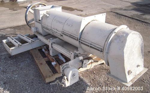 Used California Pellet Mill, Model 7122, carbon steel. Unit includes front hood and conditioner. Missing both motors, die, and rollers.