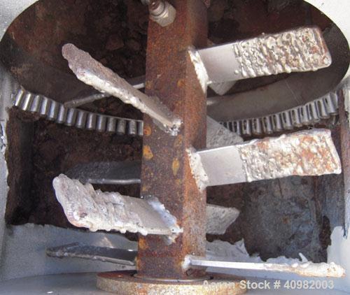 Used California Pellet Mill, Model 7122, carbon steel. Unit includes front hood and conditioner. Missing both motors, die, and rollers.
