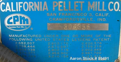 USED: California Pellet Mill, Model Master, Carbon Steel.  Approximate 14" diameter die with (2) rollers, adjustable side blades. Driven by a 25 hp, 3/60/208-230/460 volt, 1170 rpm motor. Bolt on fro...