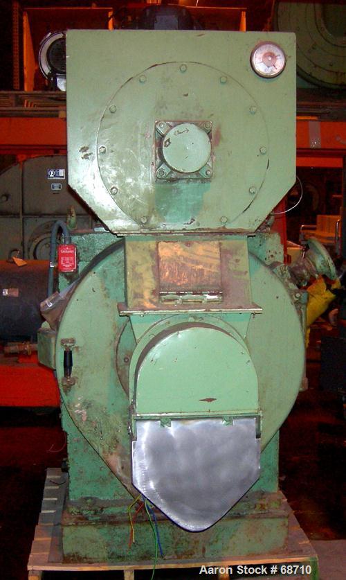USED- California Pellet Mill, Model 2000, Carbon Steel. 2 approximate 7" diameter rollers, 16" diameter x 10" deep cutting c...
