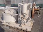 Used California Pellet Mill, Model 7122, carbon steel. Unit includes front hood and conditioner. Missing both motors, die, and rollers.