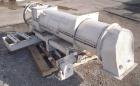 Used California Pellet Mill, Model 7122, carbon steel. Unit includes front hood and conditioner. Missing both motors, die, and rollers.