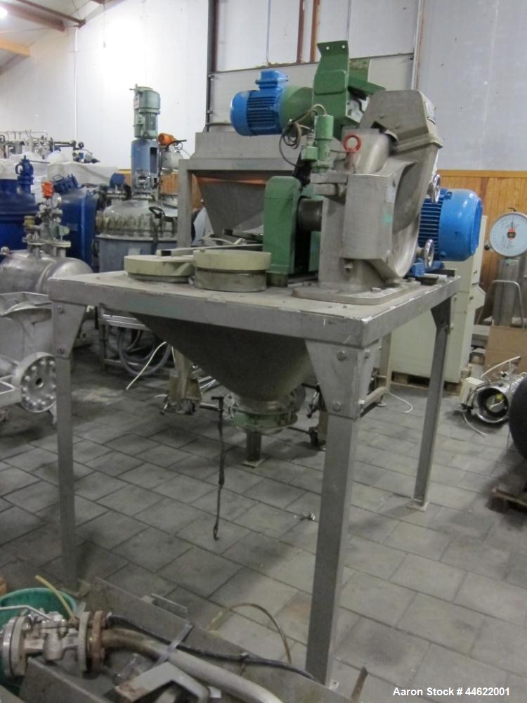 Used Alpine Mill, Model 315UPZ, stainless steel construction. Mill speed 9000 rpm. 29.3 Hp/22 kW motor, 50 Hz, EX. Includes inclined conveyor, hopper and technical documentation. New 1986. Frame moun...