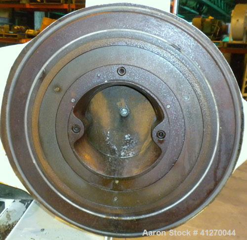 Used Bauermeister Universal Mill, Model UT22, Carbon Steel. Approximately 18-1/2" diameter x  6" deep sieve ring assembly, Approximately 17-1/2" diameter revolving rotor. Hinged front door with a top...