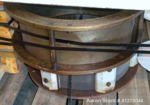 Used Bauermeister Universal Mill, Model UT22, Carbon Steel. Approximately 18-1/2" diameter x  6" deep sieve ring assembly, Approximately 17-1/2" diameter revolving rotor. Hinged front door with a top...