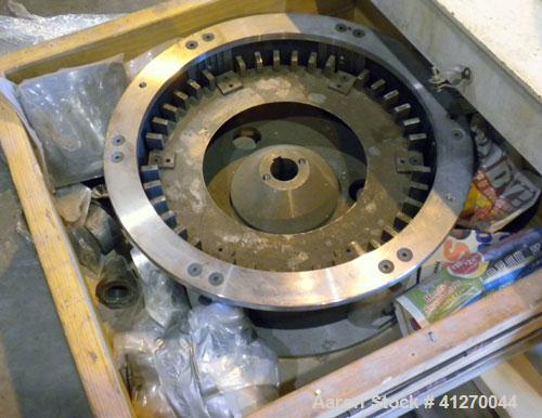 Used Bauermeister Universal Mill, Model UT22, Carbon Steel. Approximately 18-1/2" diameter x  6" deep sieve ring assembly, Approximately 17-1/2" diameter revolving rotor. Hinged front door with a top...