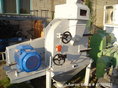 Used Gruber Hermanos 24-AP pan mill, cast iron, duplex 24-AP and sic mill, 14.2" (360 mm), diameter rotor with 4 rows of 0.4" (10 mm) diameter pins, reduced down to 0.24" (6 mm) pitch with feed hoppe...