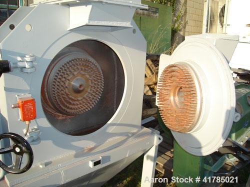 Used Gruber Hermanos 24-AP pan mill, cast iron, duplex 24-AP and sic mill, 14.2" (360 mm), diameter rotor with 4 rows of 0.4" (10 mm) diameter pins, reduced down to 0.24" (6 mm) pitch with feed hoppe...