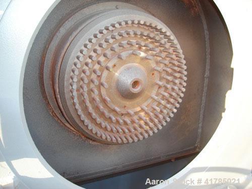Used Gruber Hermanos 24-AP pan mill, cast iron, duplex 24-AP and sic mill, 14.2" (360 mm), diameter rotor with 4 rows of 0.4" (10 mm) diameter pins, reduced down to 0.24" (6 mm) pitch with feed hoppe...