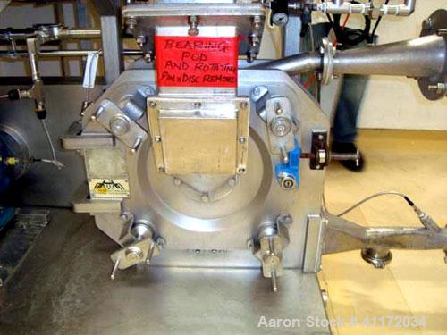 Used Kemutec Universal Mill, Stainless Steel. Approximately 400 mm diameter. Can be used with pin or beater blades. Main motor approximately 7.5 kw belt driven. Includes feeder hopper, Kek stainless ...