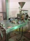 Used Bauermeister Lab Mill, Model ULD. Stainless steel construction, pin mill design, approximately 1 kw motor with vibrating feeder.