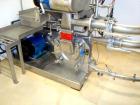 Used Kemutec Universal Mill, Stainless Steel. Approximately 400 mm diameter. Can be used with pin or beater blades. Main motor approximately 7.5 kw belt driven. Includes feeder hopper, Kek stainless ...