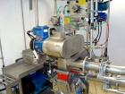Used Kemutec Universal Mill, Stainless Steel. Approximately 400 mm diameter. Can be used with pin or beater blades. Main motor approximately 7.5 kw belt driven. Includes feeder hopper, Kek stainless ...
