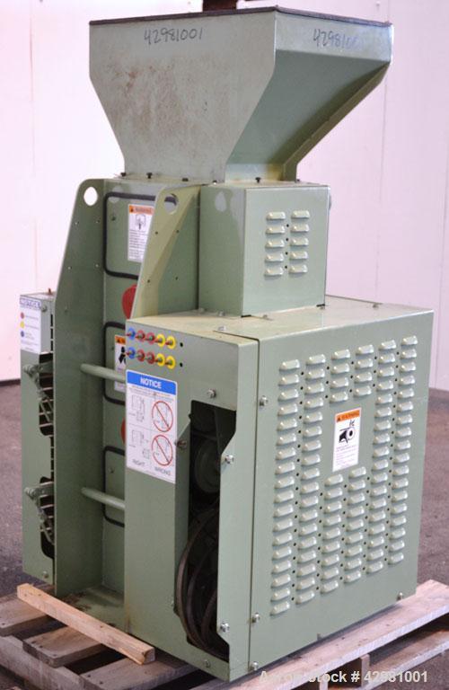 Used CPM Roskamp Series 900 Roller Mill, Type DP900-12, Carbon Steel.  (2) Pairs of  9’’ diameter x 12’’ wide rolls. Manually adjustable.  Manual feed gate adjustment, top feed hopper.  Driven by a 1...