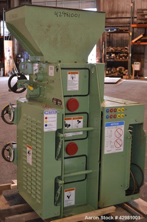 Used CPM Roskamp Series 900 Roller Mill, Type DP900-12, Carbon Steel.  (2) Pairs of  9’’ diameter x 12’’ wide rolls. Manually adjustable.  Manual feed gate adjustment, top feed hopper.  Driven by a 1...