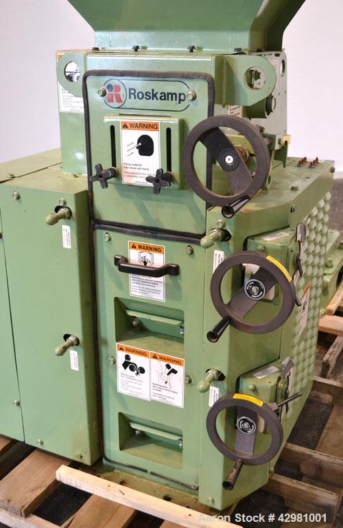 Used CPM Roskamp Series 900 Roller Mill, Type DP900-12, Carbon Steel.  (2) Pairs of  9’’ diameter x 12’’ wide rolls. Manually adjustable.  Manual feed gate adjustment, top feed hopper.  Driven by a 1...