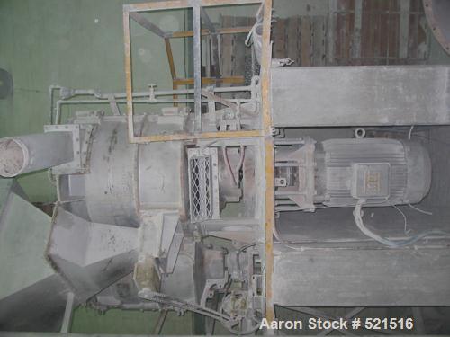 USED: Raymond vertical mill, model VM-35. 150 hp motor, includes feeder. Reported to be reconditioned and in excellent condition. Manufactured by CBC in 1987.
