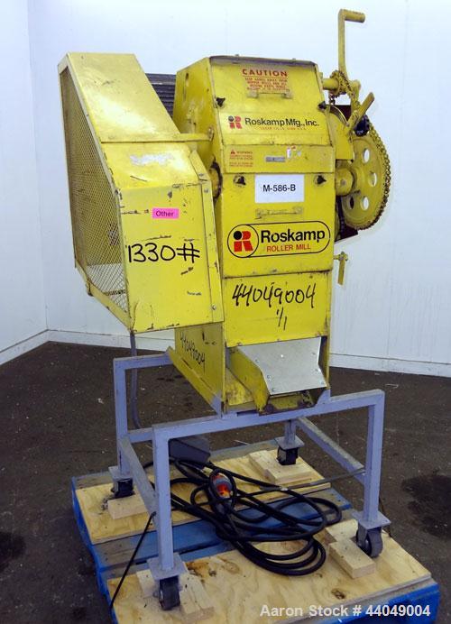 Used Roskamp Roller Mill, Model K, Carbon Steel. (2) Approximately 9" diameter x 12" wide grooved rolls, manually adjustable, 11" X 13" top feed, bottom discharge. Driven by a 7.5 hp, 3/60/230/460 vo...