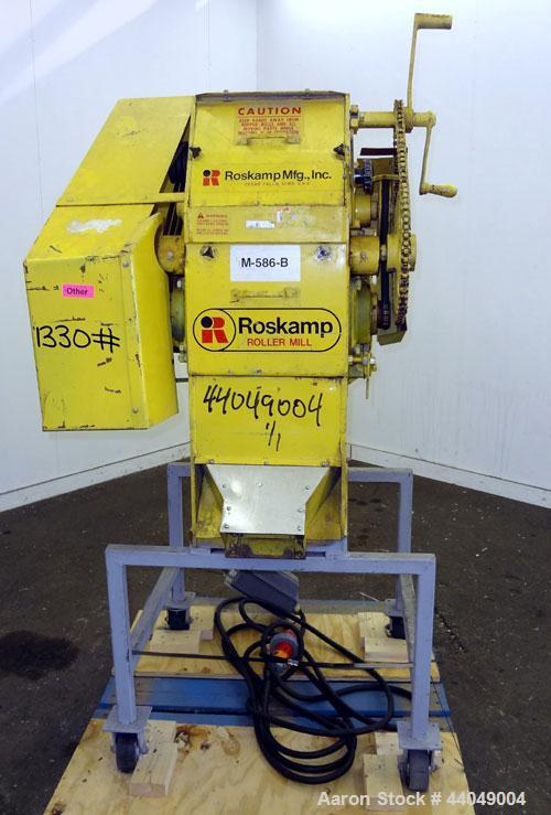 Used Roskamp Roller Mill, Model K, Carbon Steel. (2) Approximately 9" diameter x 12" wide grooved rolls, manually adjustable, 11" X 13" top feed, bottom discharge. Driven by a 7.5 hp, 3/60/230/460 vo...