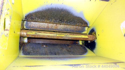 Used Roskamp Roller Mill, Model K, Carbon Steel. (2) Approximately 9" diameter x 12" wide grooved rolls, manually adjustable, 11" X 13" top feed, bottom discharge. Driven by a 7.5 hp, 3/60/230/460 vo...